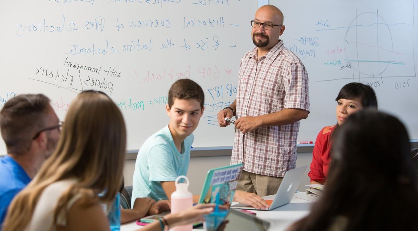 professor adrian pantoja teaches a political studies class